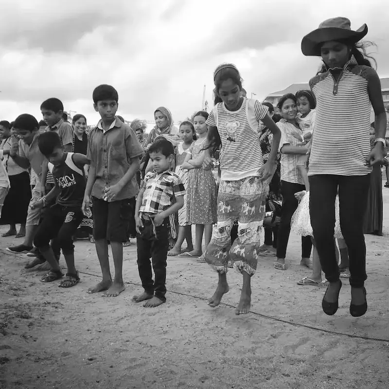 Kids playing game on beach